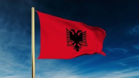 4K Albania flag slider style. Waving in the win with cloud background animation Stock video