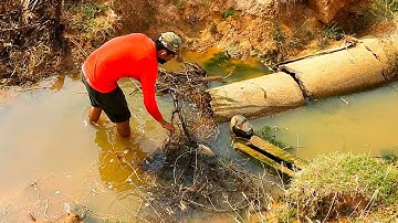 Unclogging Culvert Clogged By Garbage Drain Water