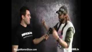 Reggie Warren gets punched in face by Reporter!