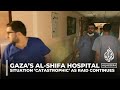 Gaza’s al-Shifa hospital head says situation ‘catastrophic’ as Israeli raid continues