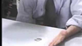 Coins Through Table (World's Greatest Magic) - DVD