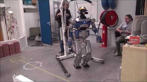 Motion generation for pulling a fire hose by a humanoid robot