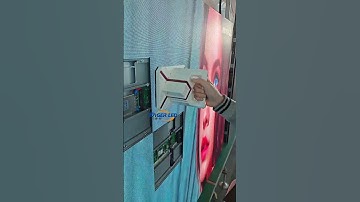 The technician is installing the LED screen with suction cups. #leddisplay #ledwall #eagerled