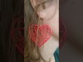 Heart-shaped earrings with lotus as a gift for Valentine's Day