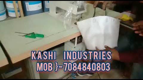 Single Punch Loop Handle Non Woven Carry Bag Machine.