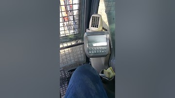 How to access service menu on John Deere trackhoe