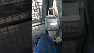 How to access service menu on John Deere trackhoe