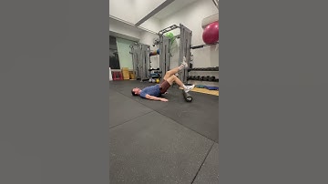 Single Leg Foam Roller Hamstring Bridge
