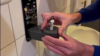 Hoe Open Ik De Lesseau Dispenser Met Een Sleutel?