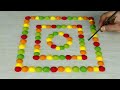 Simple rangoli for holi with spoon - Satisfying sand art video - Rangoli designs with colours
