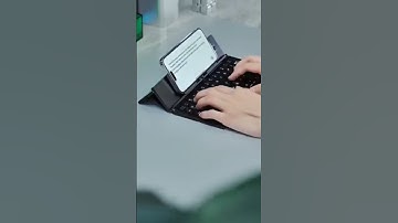 Foldable bluthooth keyboard compactible with phone and tablet