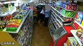 Armed robber loses shoe and gun as he runs away from shop