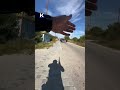 Ukrainian soldier destroys Russian FPV drone on a road