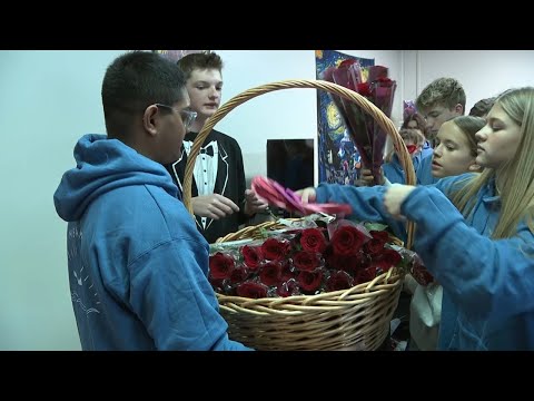 Oquirrh Hills Middle School students continue Valentine tradition of roses for every girl