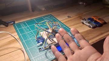 sistem parkir otomatis menggunakan arduino nano, sensor infra red, sensor ultrasonic, dan juga servo