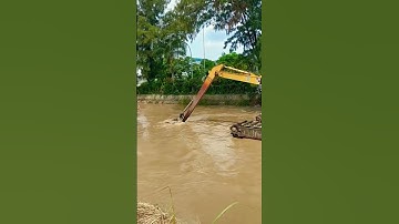 close view of river normalization and dredging with amphibious excavator #shorts #shortsvideo