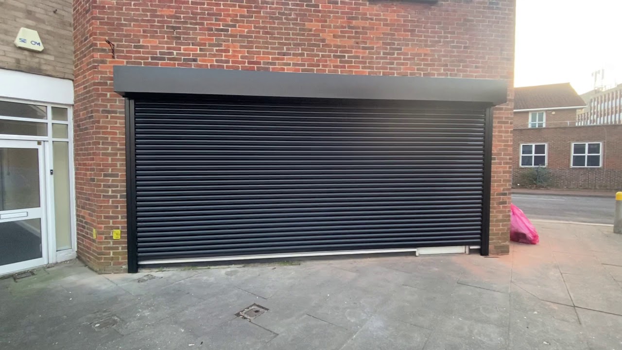 Black steel shop front roller shutter