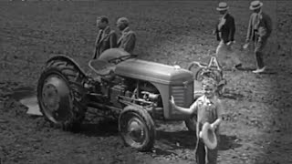Eight year old test driver for the Ford 9N. History of agricultural machinery series.