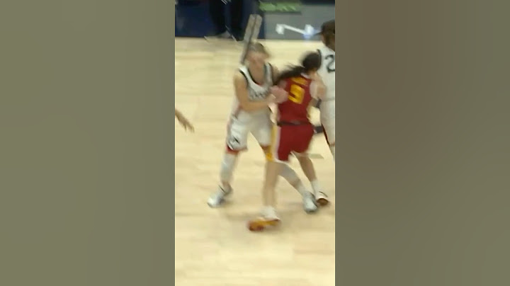 Paige Bueckers gets called for a moving screen