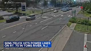 Video captures semi-truck bringing down power lines in NJ