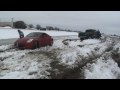 Four truck to get one car out of snow.  read description