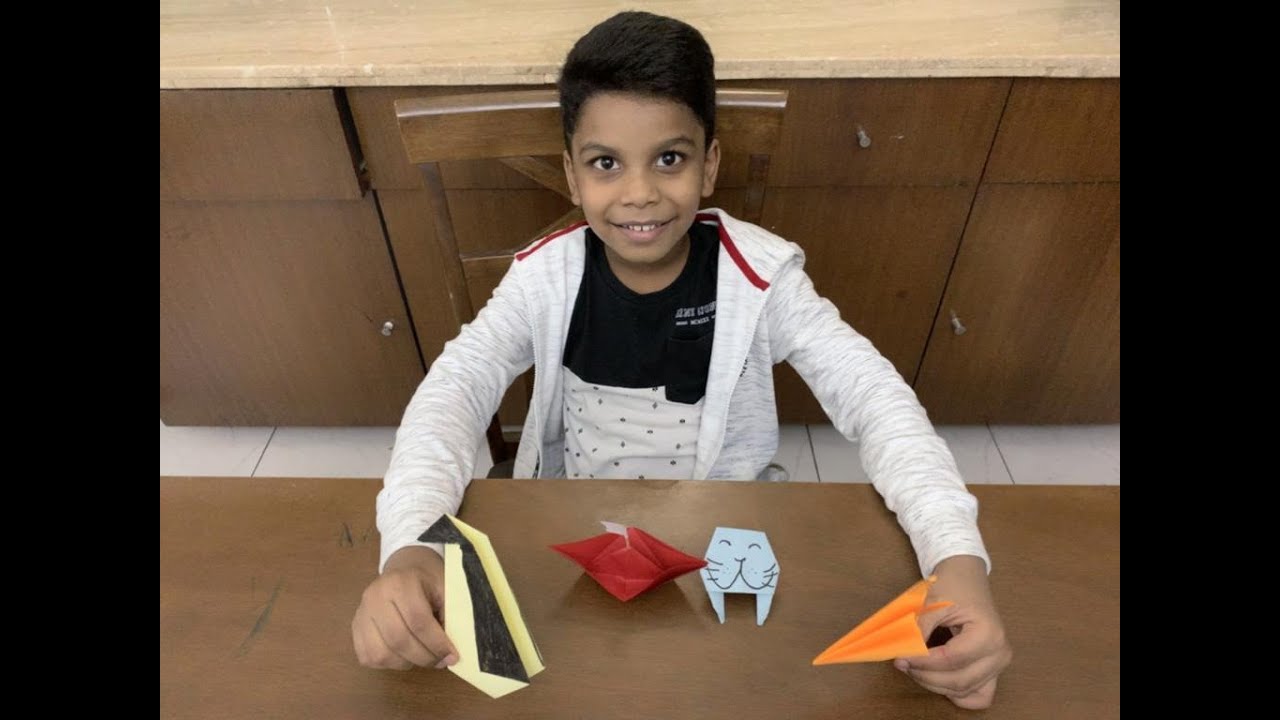 Ritwik creates Sea animals and a boat with Origami papers