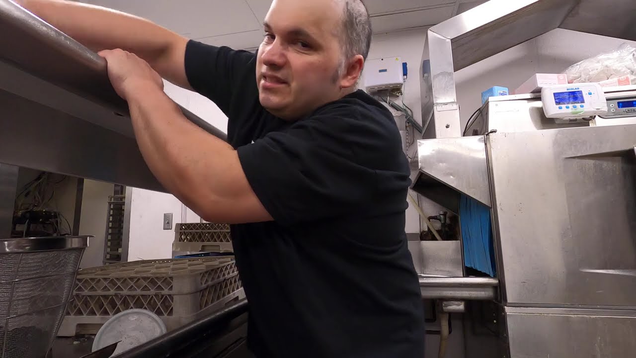 THE DISHWASHER MAN IS A OLD ADULT FILM STAR CLEANING A DIRTY KITCHEN NEAR YOU MINIMUM WAGE WORK 