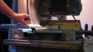 Man Using Pendulum Saw