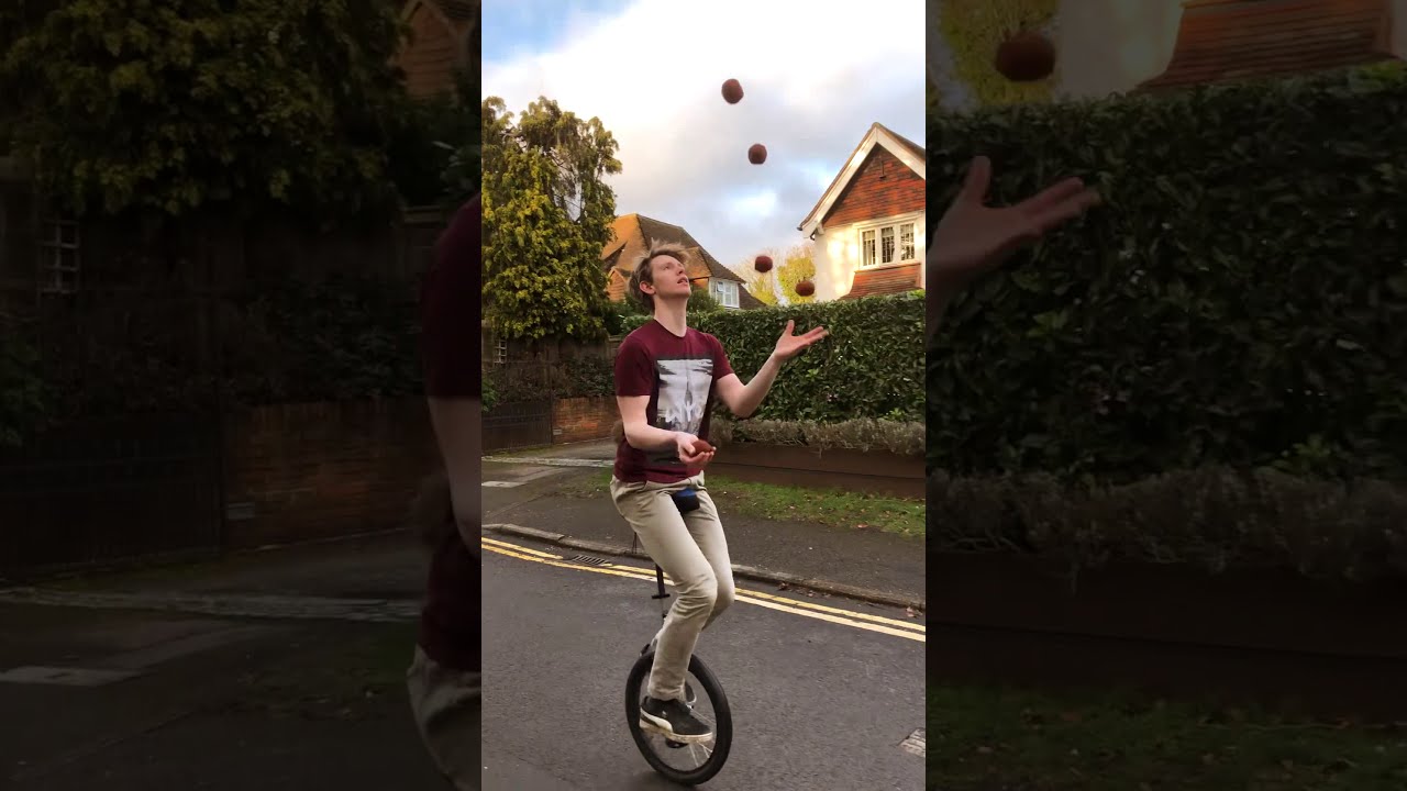 5 Ball Juggling on a Unicycle! (Former World Record)