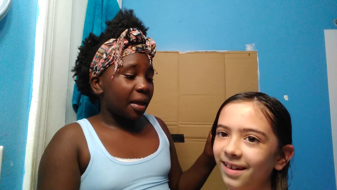 My friend doing my hair