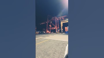 POV - Night time container port