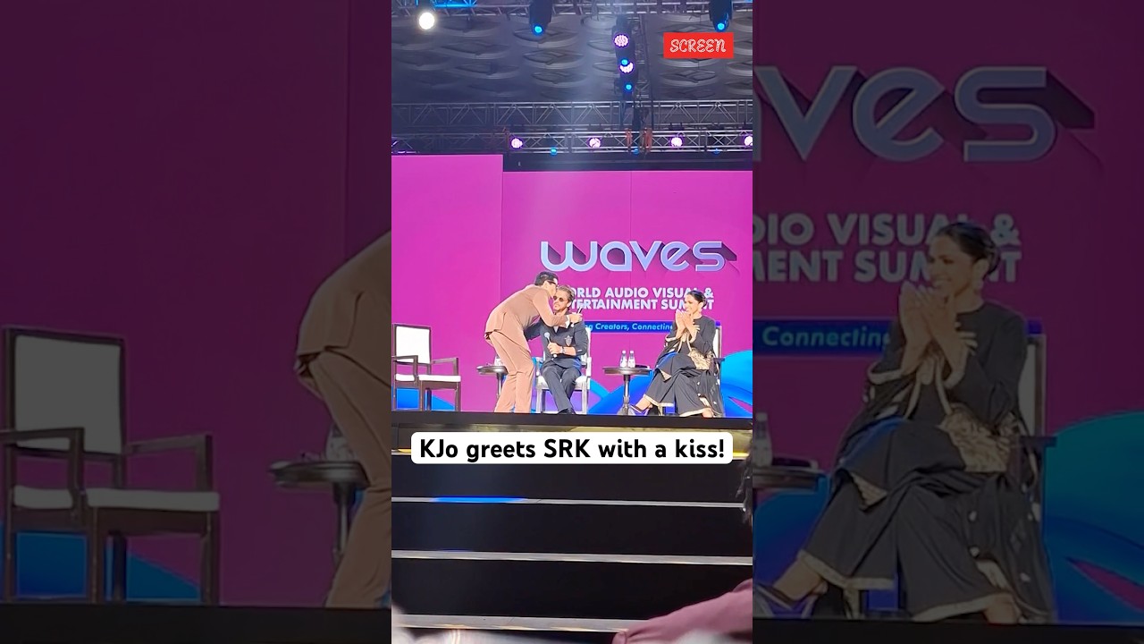 Watch the adorable moment when Karan Johar Kisses SRK! 