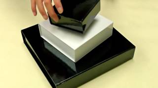 Collapsible rigid gift boxes