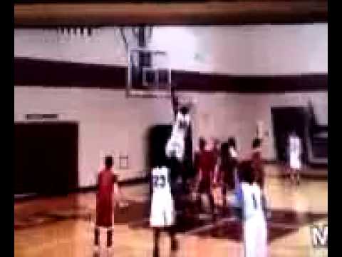 6th grader Cody Riley dunks