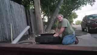 Tire work on the side of the road, split rims.