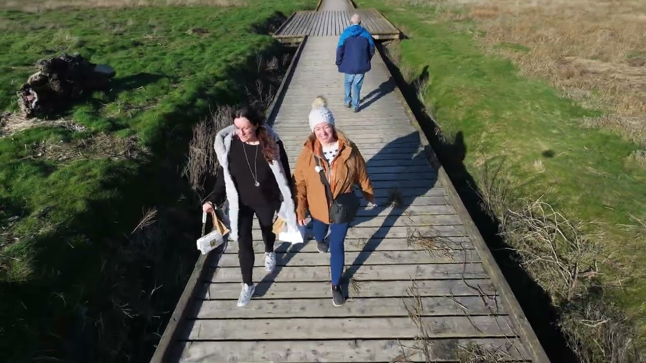 Strange looks off people walking with Drone Neo 2 Sister jetty walk