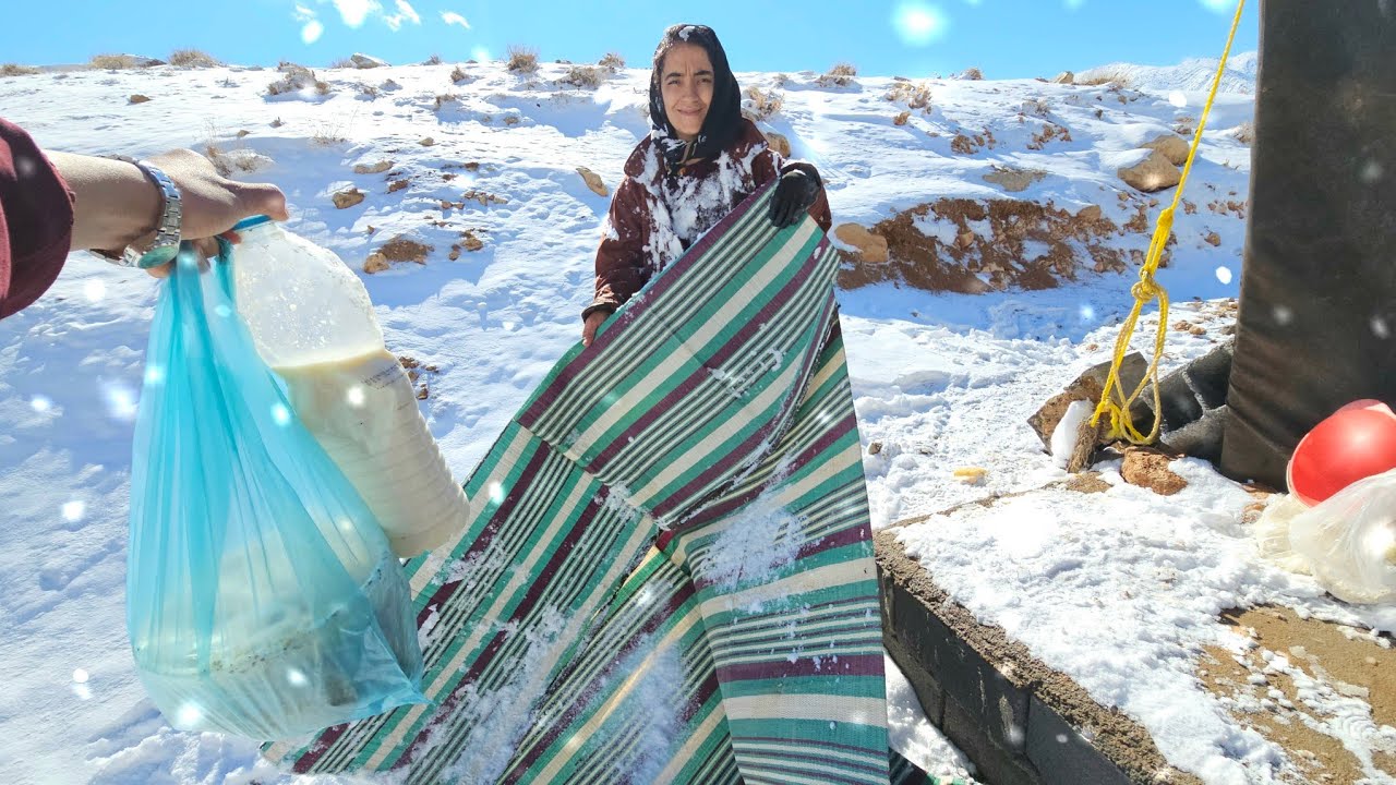 "A Mother's Love in a Snowstorm: Elham's Unbreakable Will!"