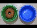 How to move a donut from a green bowl to a blue bowl