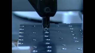 Screw Feed System on a Six Axis Robot | Assembly Automation Industries