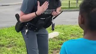 KID TERRIFIED ON SIGHTING A COP COMFORTED BY THE COP