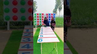Who can pop the highest number of balloons by rolling bottles on the board? #shortsfeed #reelsfeed