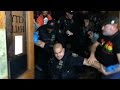 Portland police push, pepper spray protesters out of city hall