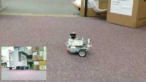 Robot with NXTCam5 Exploring the Room