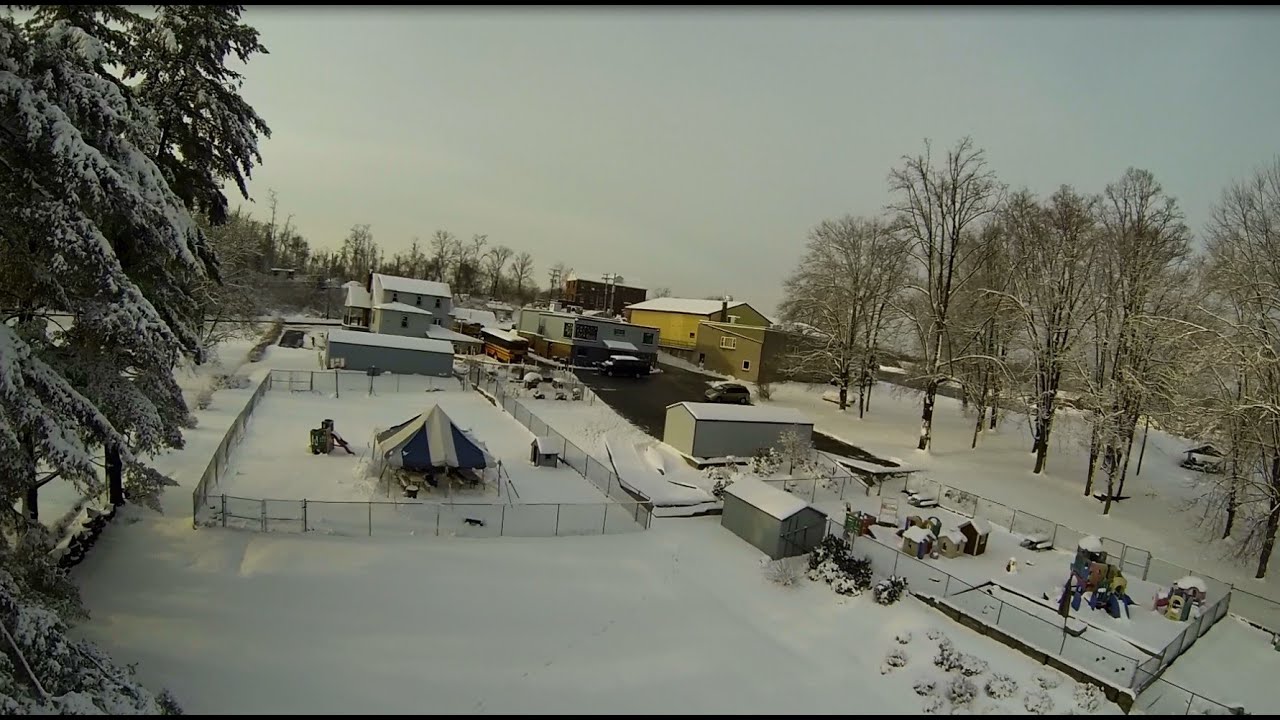Whales Snails and Puppy Dog Tails flyover with snow covering everything in morning sunshine