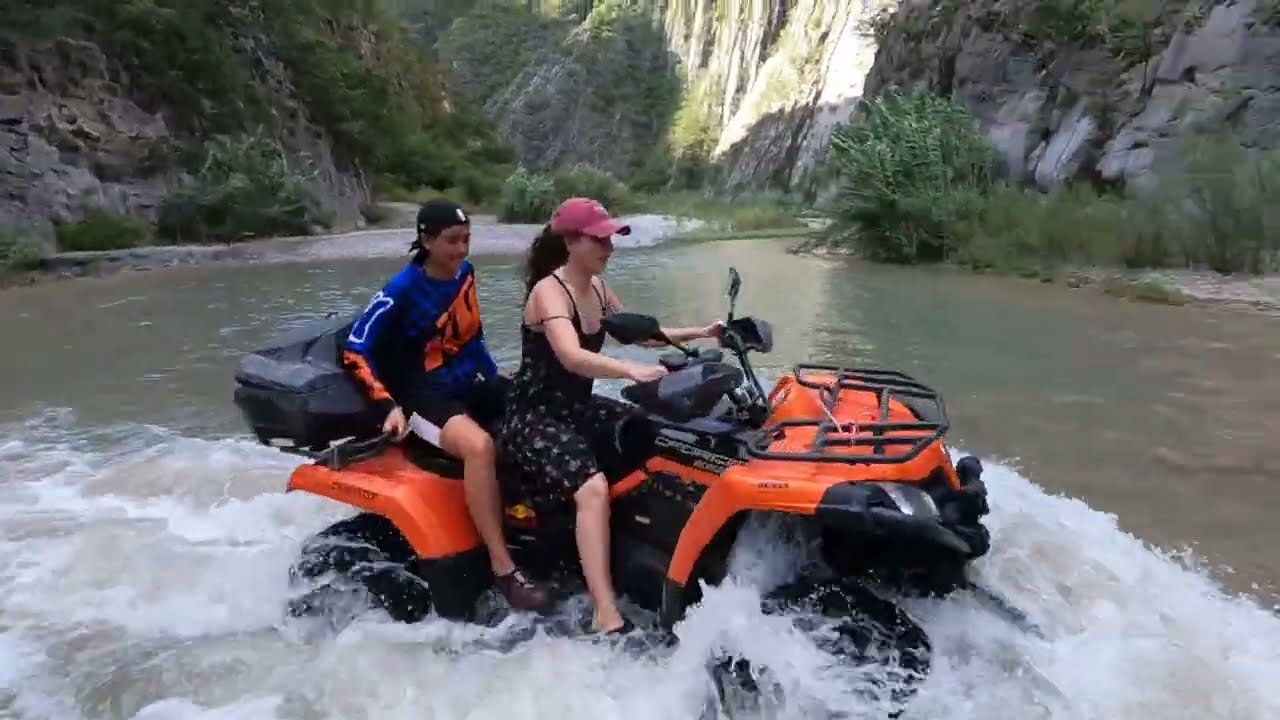 Riding ATVs in River - YouTube