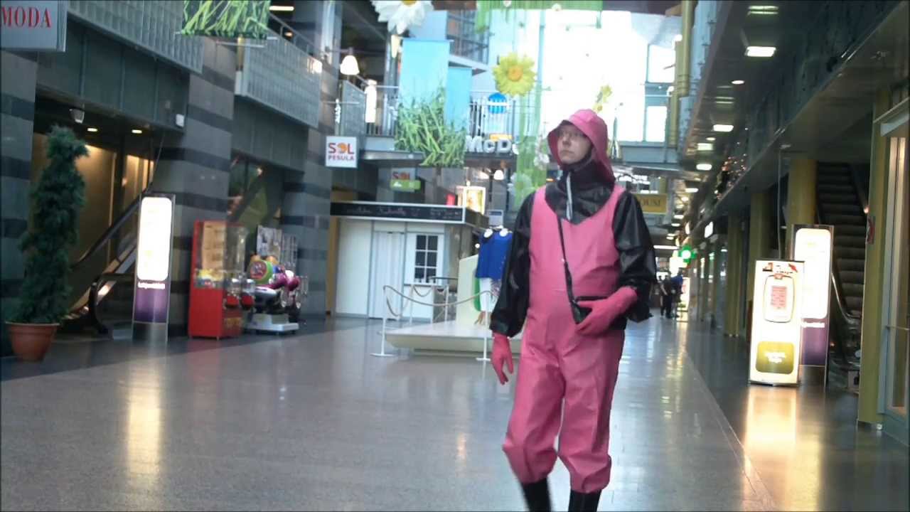 pink rainwear bib-pants and latex in public