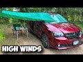 Solo car camping in rain storm with my zero breeze ac  van life