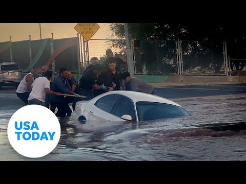 Sinkhole swallows flooded car in Texas | USA TODAY