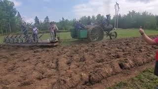 steam tractor plowing with 8 bottom plow