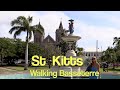 St Kitts, walking round Basseterre. Jean nearly causes havoc ringing the town bell.